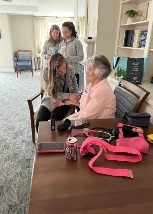 Students perform health screenings for older adults at Bessey Crossing